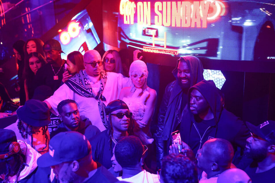 Kanye West (third from r.) and Bianca Censori (c.) were seen at this year's Art Basel in Miami after spending time overseas.