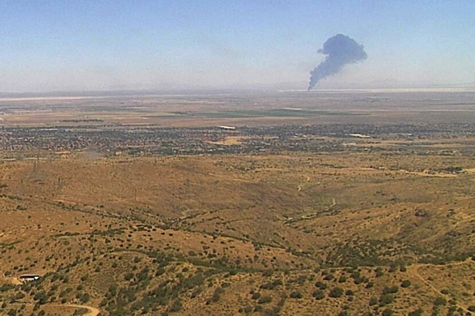 Smoke rises from Edwards Air Force Base after the crash of a US Air Force B-52 bomber on June 15, 2026.