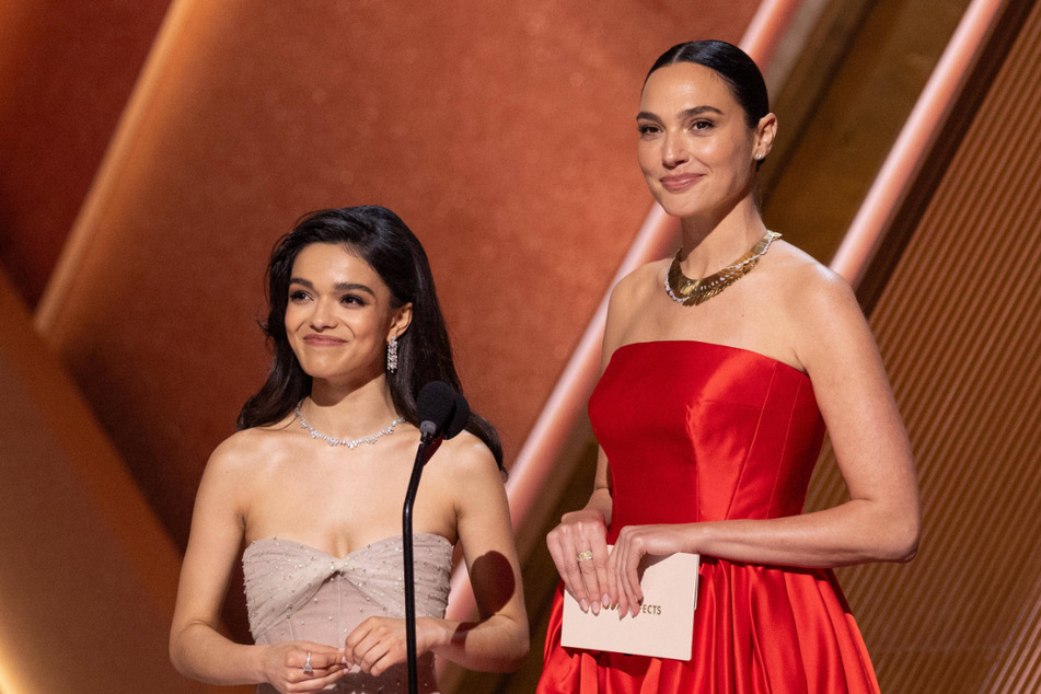 Rachel Zegler (l.) portrays the titular princess in Disney's Snow White remake, while Gal Gadot stars as the Evil Queen.
