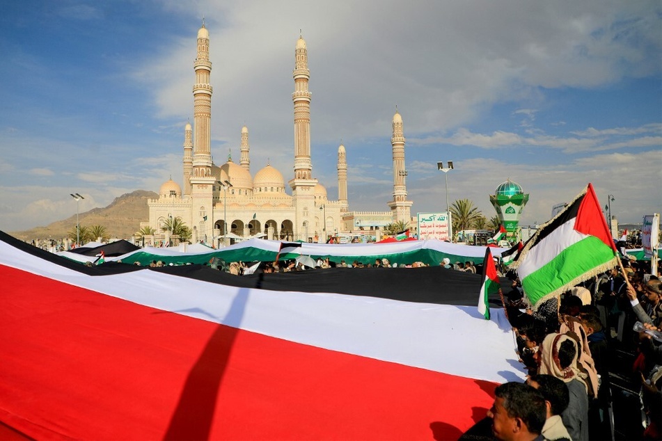 Yemenis march in the capital city of Sanaa in support of Palestinians under Israel siege.