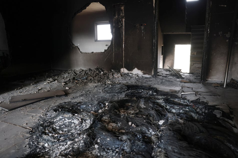 Damage is pictured inside a house belonging to the al-Toubasi family after an Israeli settler attack.