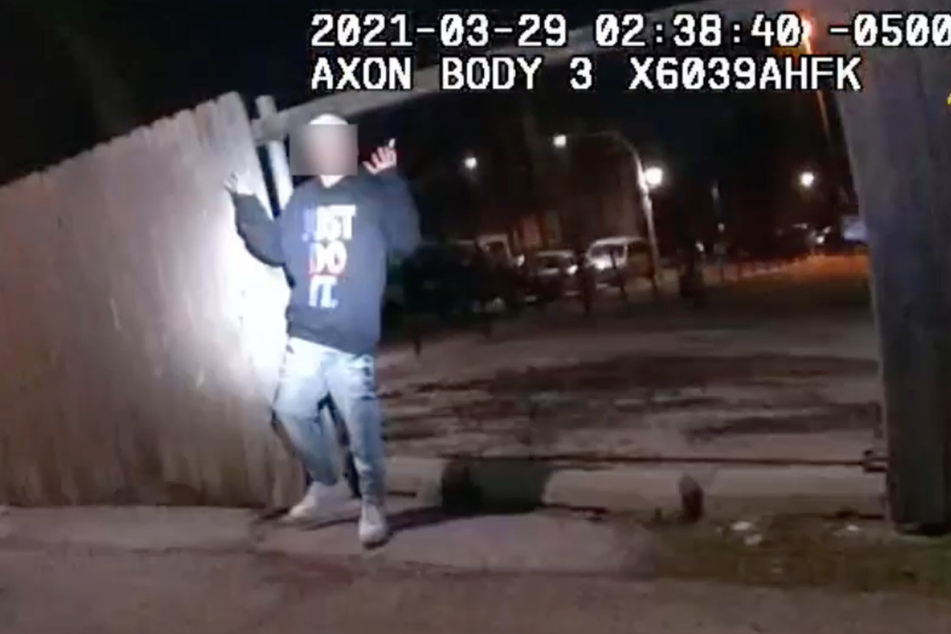 A still from the bodycam footage released by the Chicago PD, showing Adam Toledo turning around with his hands up just before he was fatally shot by Officer Eric Stillman.
