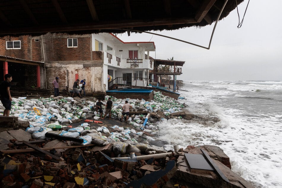 Hurricane Polo bashes Mexican coast with towering waves: "Our buildings have been falling apart"