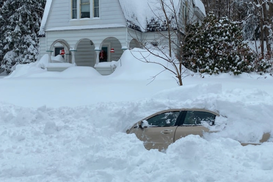 Upstate New York driver rescued from car buried under four feet of snow