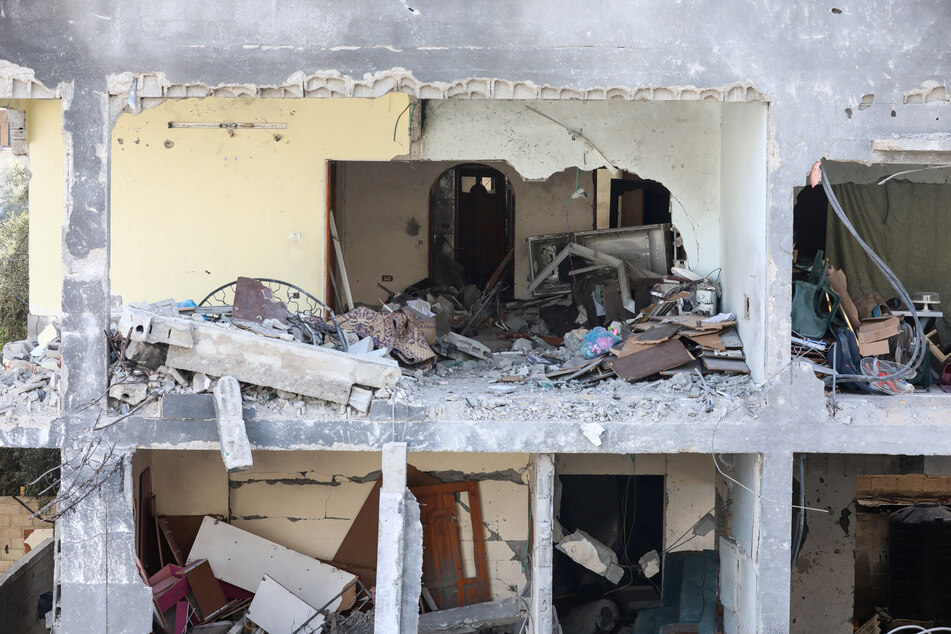 Israel again struck central Gaza's Nuseirat refugee camp, killing at least 13 people, according to local authorities.