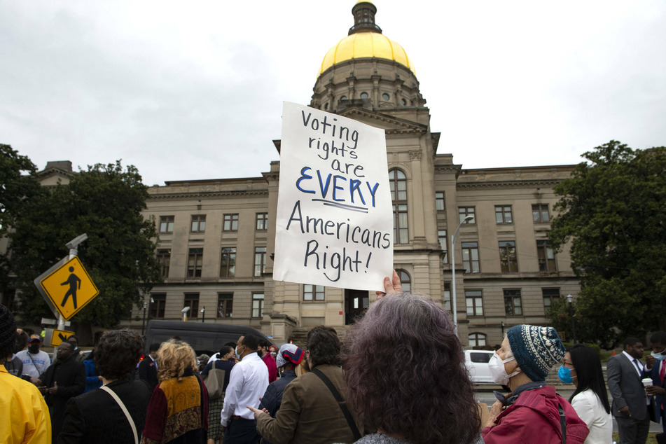 The controversial voting election bill passed the Georgia House amid protests that the proposals would make it harder for voters to participate in democracy.