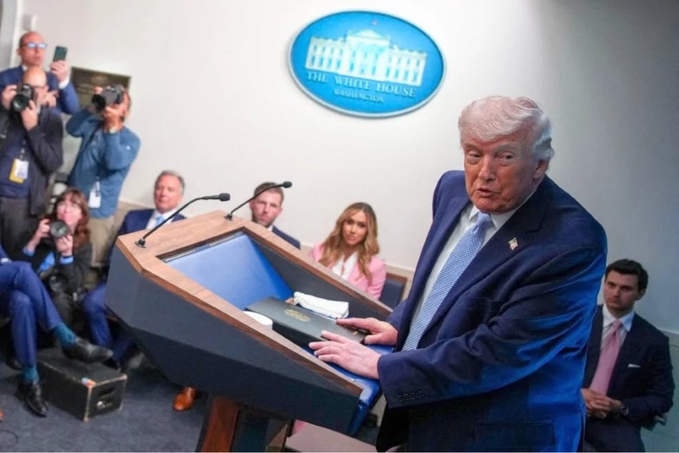 President Donald Trump speaks during a news conference on April 6, 2026. Reporters with MS NOW, CNN, and Politico were denied access to the White House on Thursday after a judge ordered Trump to lift his ban on them.