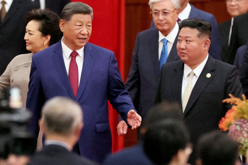 Chinese President Xi Jinping and North Korean leader Kim Jong Un arrive for a reception marking the 80th anniversary of the end of World War Two, at the Great Hall of the People in Beijing, on September 3, 2025.