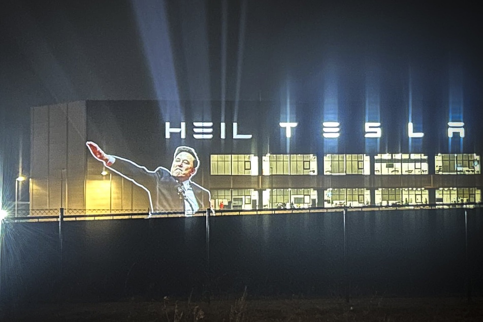 Activists project "Heil" on Tesla plant in Germany in response to Elon Musk salute