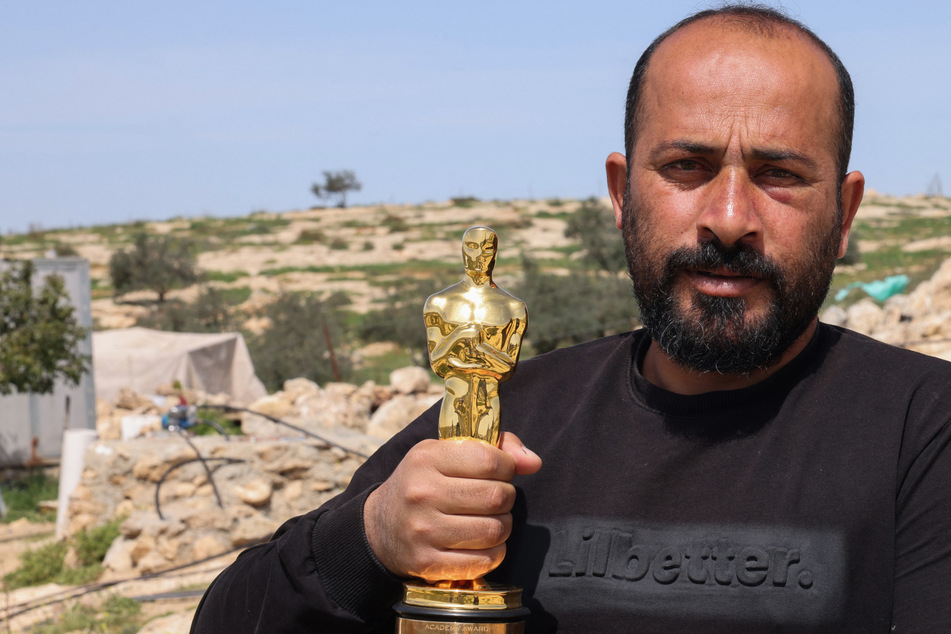 Palestinian director says Israeli settlers "brutally" assaulted him over Oscar win