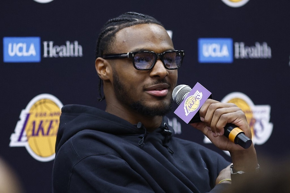 LeBron James is expected to make a deal to stay with the Los Angeles Lakers to play alongside his son Bronny (pictured).