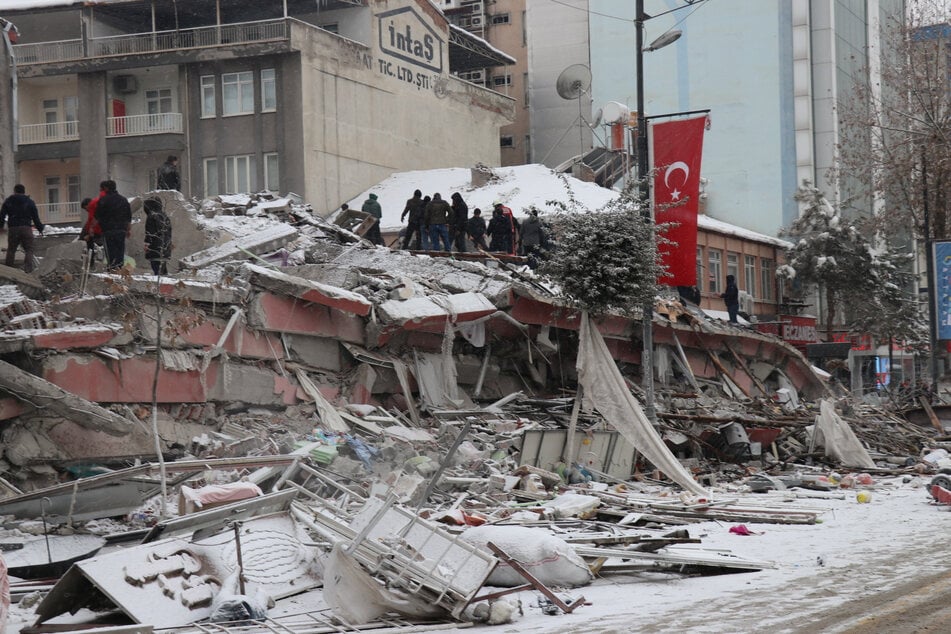 Rescue efforts take place amid the rubble of collapsed buildings after an earthquake in Malatya, Turkey, on February 6, 2023.