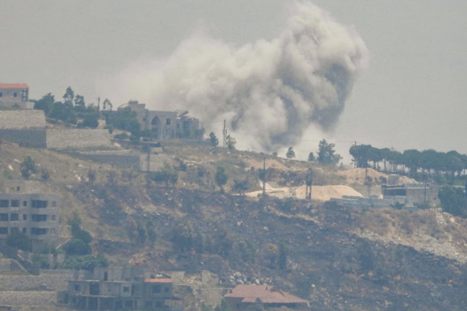 Smoke billows during Israeli bombardment on the southern Lebanese border village of Khiam on June 5, 2024.