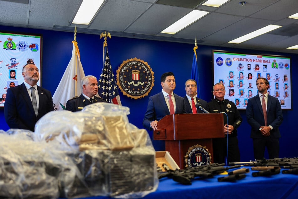 First Assistant US Attorney for the Central District of California Bill Essayli speaks as charges are laid out transnational organized crime groups on Tuesday.