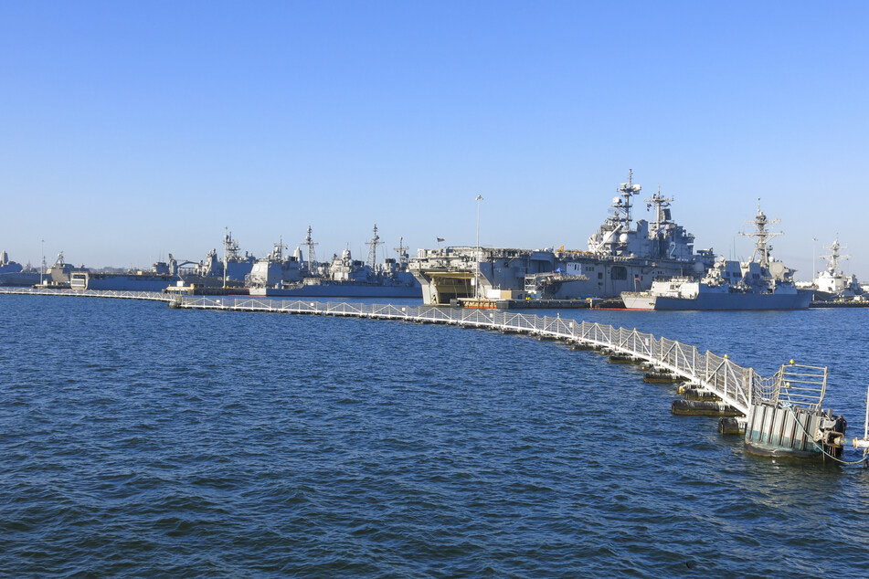 The two sailors are accused of divulging locations, photographs, and other logistical information about US maritime movements.