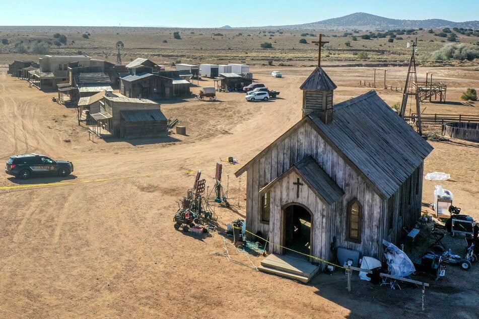 The Santa Fe County Sheriff's deputy unit arrives at the Bonanza Creek Ranch movie set.