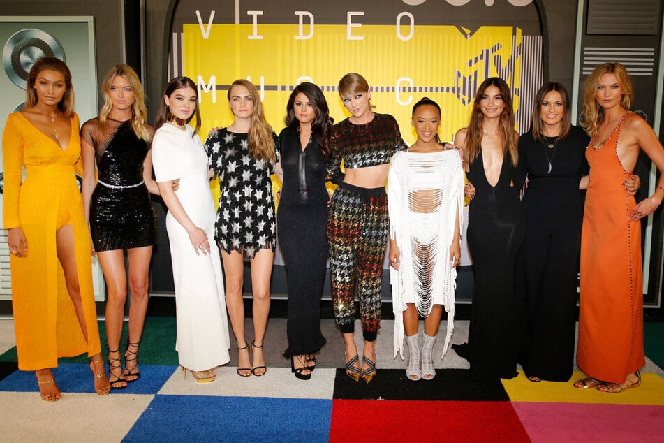 Taylor Swift (center r) was famous for her star-studded girl gang during the 1989 era, which was around 2014.