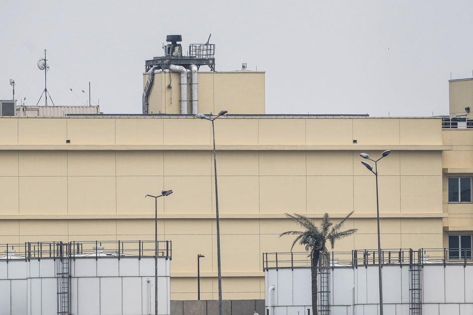 Smoke was seen rising above the US embassy in Baghdad after it was reportedly attacked on Saturday.