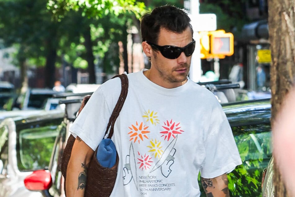 Harry Styles steps out in New York on August 26 ahead of his performance at Madison Square Garden. The pop star was caught in a heated exchange with an autograph seeker in the Big Apple on Wednesday.