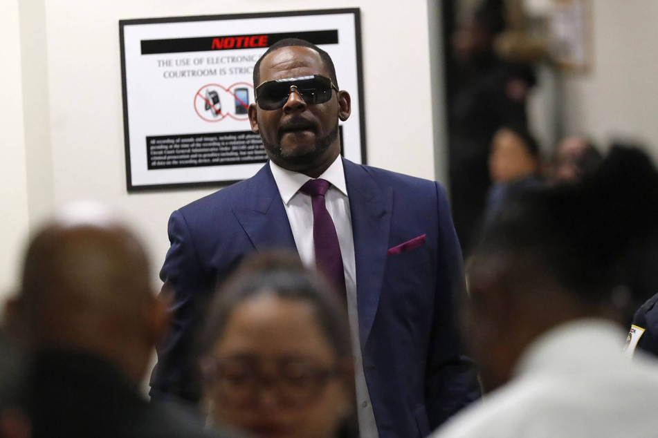 R. Kelly attends a court hearing at the Daley Center in Chicago.