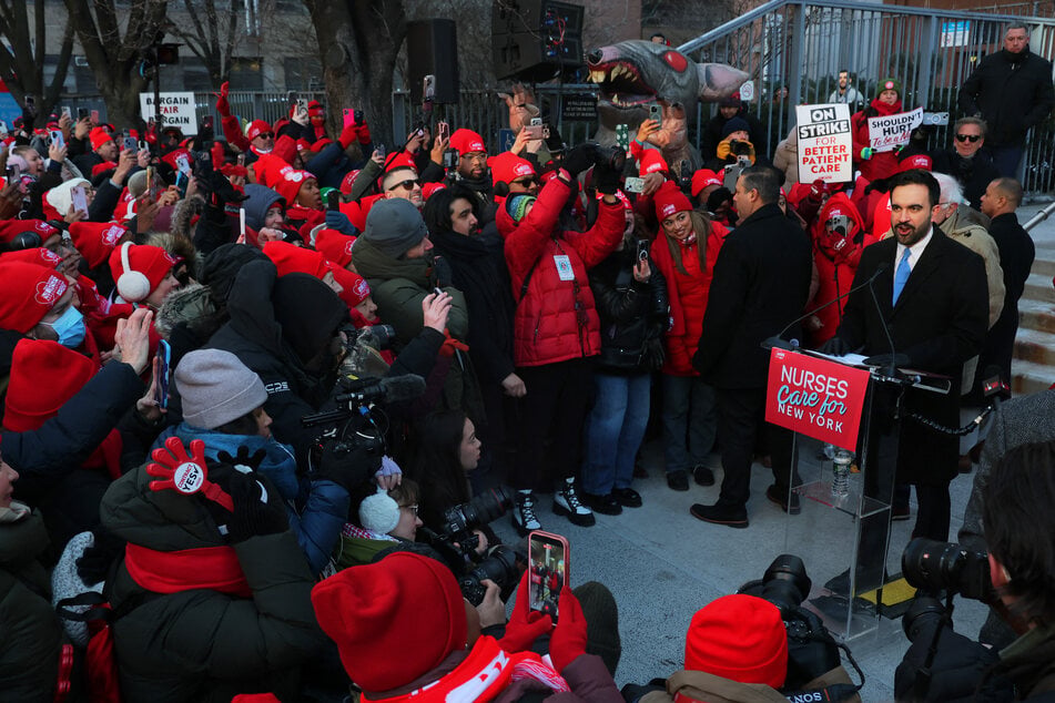 Mayor Zohran Mamdani (r) speaks to nurses from Mount Sinai West striking outside the hospital on January 20, 2026 in New York City.