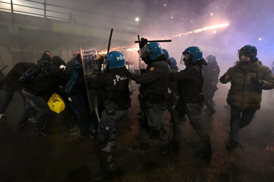 A small number of protesters clashed with police and set off fireworks.