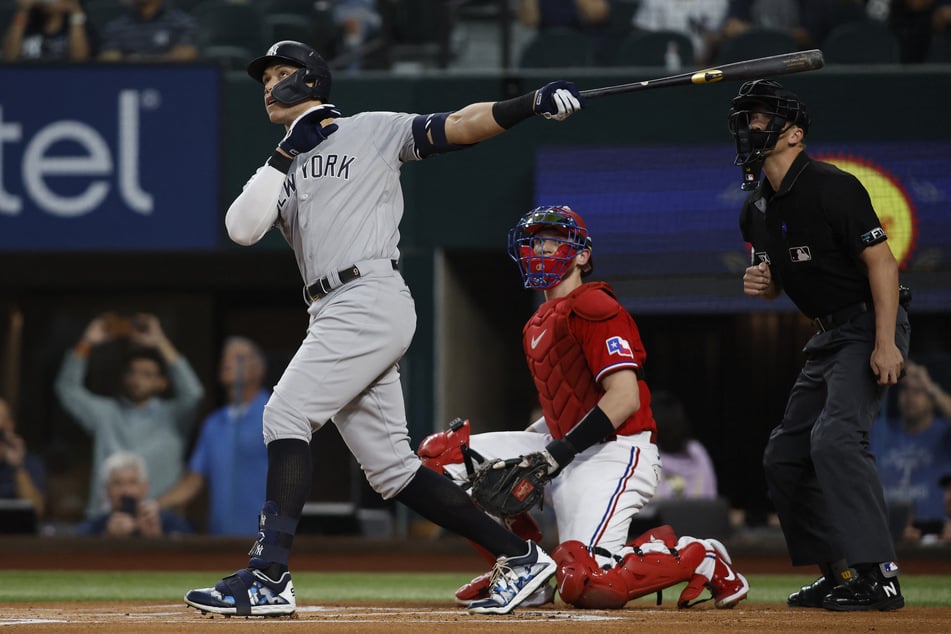 Aaron Judge smashed the third pitch on Tuesday night, hitting his 62nd home run of the season and breaking the American League record.