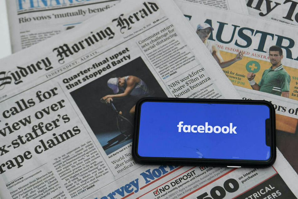 Facebook bans news posts in Australia amid dispute over media law