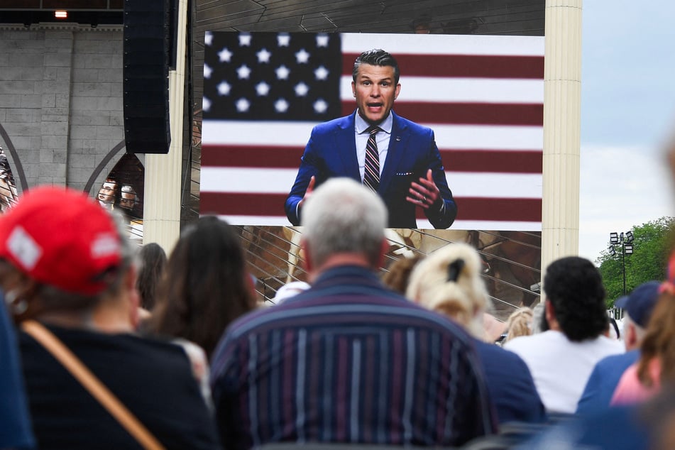Defense Secretary Pete Hegseth addressed the crowd via video.