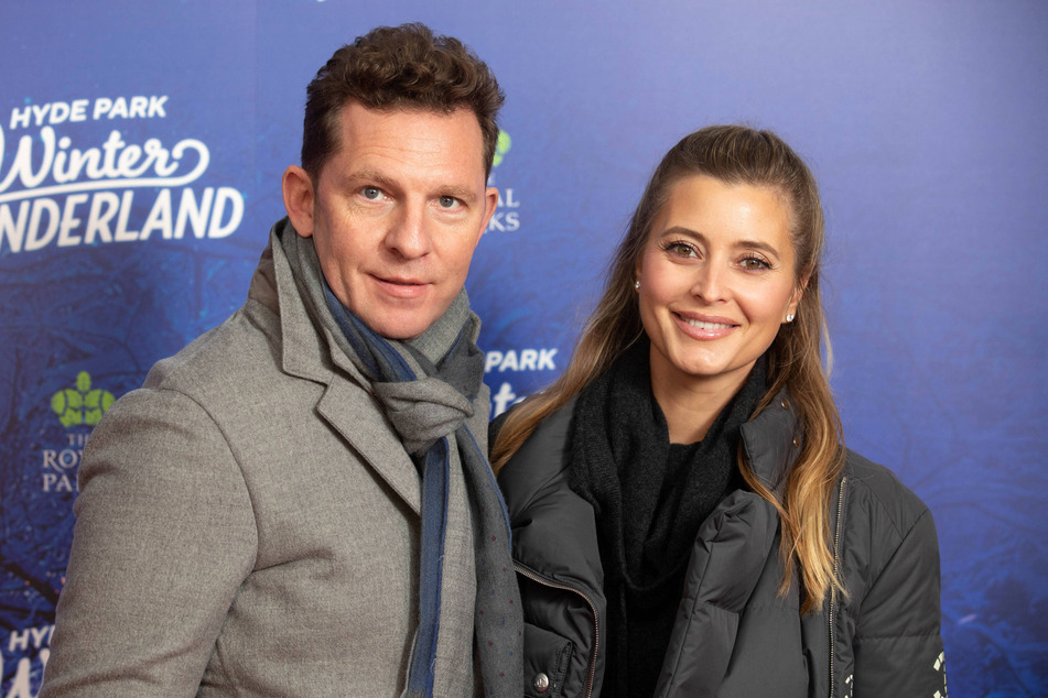 Holly Valance (r.) and her husband Nick Candy attend an event in March 2022.