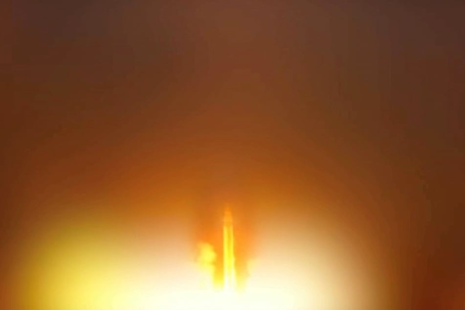 An Iranian missile is launched, as Iran's Revolutionary Guards said they had carried out attacks against a US base in Jordan and 21 other targets in the Gulf on Wednesday in retaliation for American strikes around the Strait of Hormuz, from a location given as Tehran on June 10, 2026.