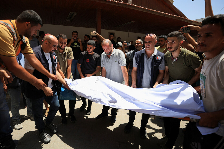 Israel bombs Gaza's only Catholic church in latest "totally unacceptable" attack on civilians