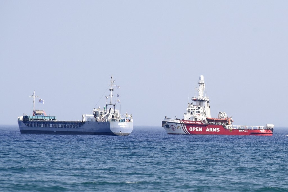 An Open Arms ship and the ship Jennifer, of the World Central Kitchen carrying food aid for the Gaza Strip, prepare to set sail close to the port of Larnaca in Cyprus.
