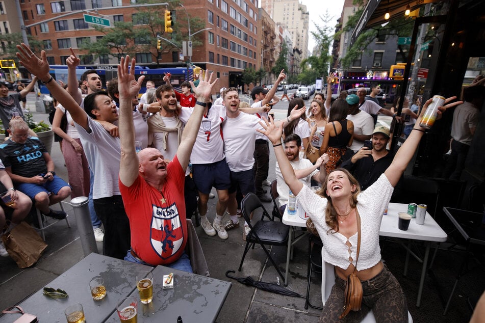England fans celebrate after their team won the 2026 World Cup match between England and Panama in New York on Saturday.