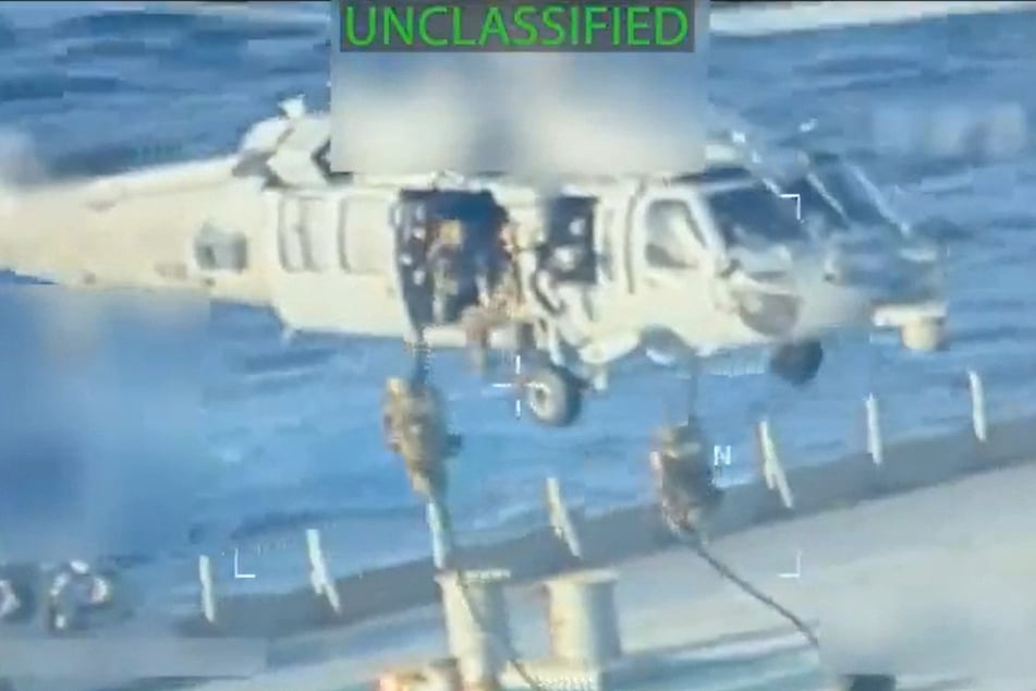 Venezuela accused the US of committing an "act of international piracy" as the Trump administration released dramatic footage of the seizure of an oil tanker.