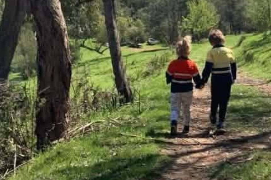 Deadly animal danger spotted hiding in a photo of children playing – disaster was inches away!