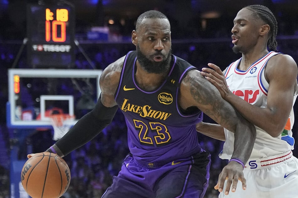 LeBron James (l.) #23 of the Los Angeles Lakers dribbles the ball against Tyrese Maxey #0 of the Philadelphia 76ers on January 28, 2025. James said his relationship with Maxey was a major factor in his decision to go to Philly.