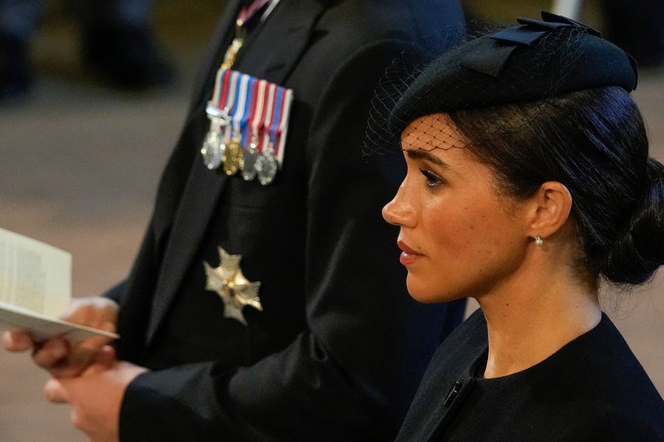 In season 2 of her Netflix series, Meghan Markle opened up about being separated from her children amid Queen Elizabeth II's funeral services.