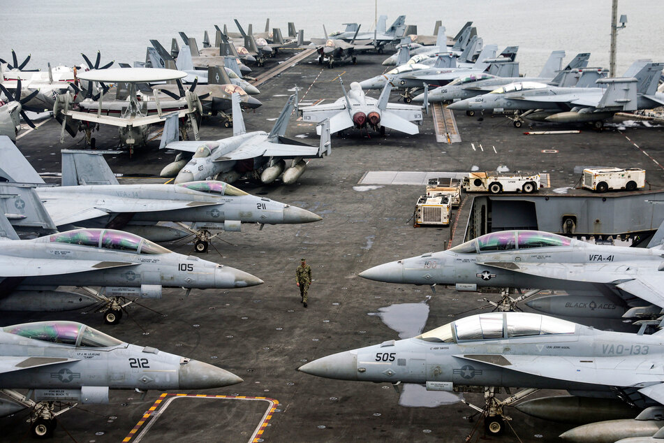 Trump boasts of "big armada" threatening Iran in ominous Venezuela comparison