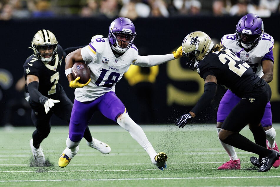 Justin Jefferson of the Minnesota Vikings runs the ball during the second quarter of the game against the New Orleans Saints at Caesars Superdome.