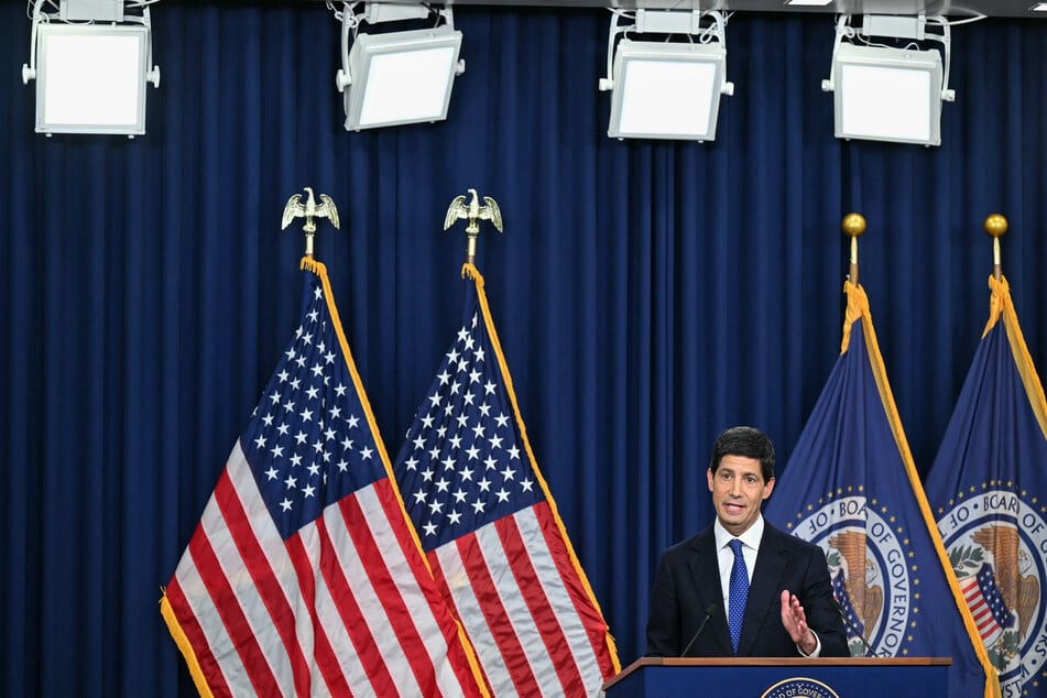 Federal Reserve Chair Kevin Warsh speaks during a news conference on September 16. The US central bank will likely need to further hike interest rates by the end of the year.