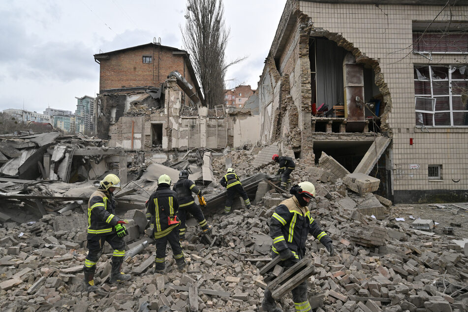 Russia launched several ballistic missiles on Kyiv on Monday, injuring at least four people and causing damage.