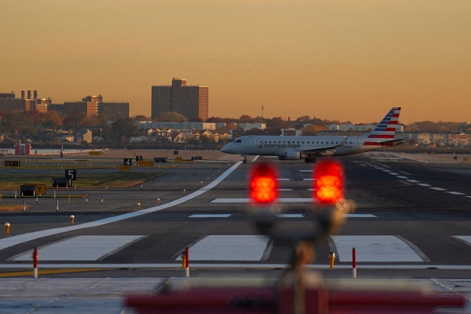 An American Airlines airplane taxis on the tarmac at New York's Laguardia Airport (Stock image). A construction mistake on Monday led hundreds of flights on the East Coast to be delayed or canceled.