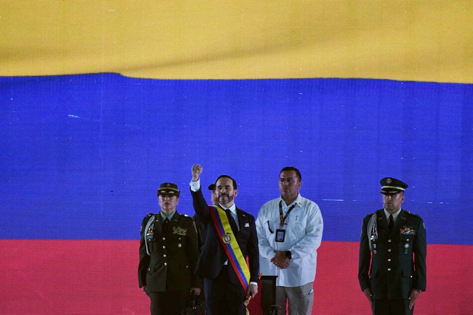 New Colombian President Abelardo de la Espriella raises a clenched fist after delivering a speech at his inauguration ceremony on August 7, 2026.