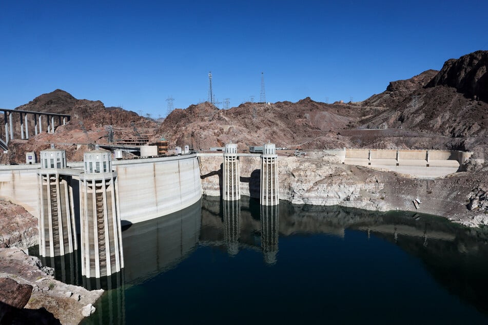 The two Arizona Intake Towers (L), two Nevada Intake Towers and the dry Nevada Spillway (R) on the upstream side of the Hoover Dam are shown on July 25, 2026 in the Lake Mead National Recreation Area, Arizona.