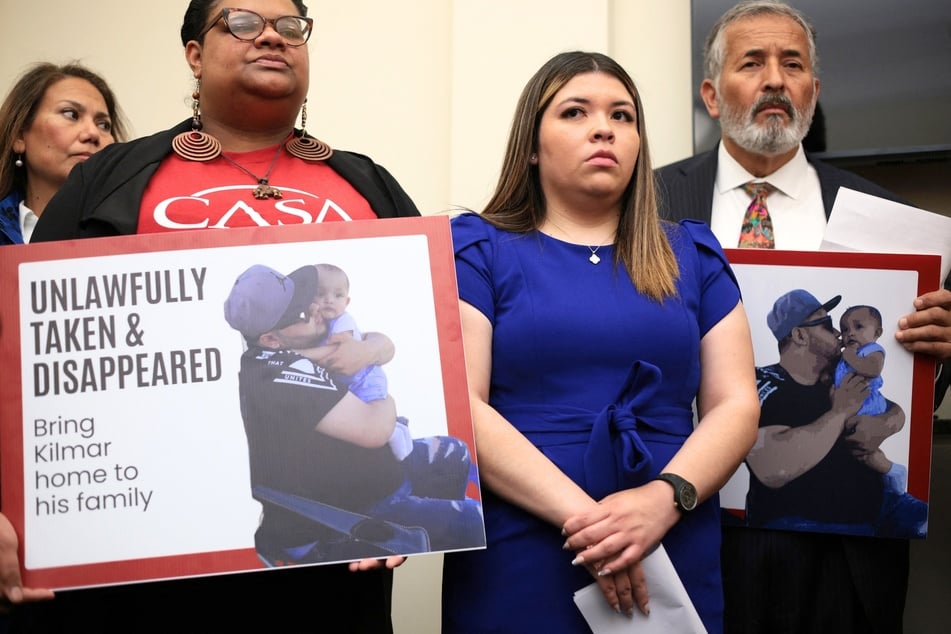 Jennifer Vasquez Sura (second from left), the wife of Kilmar Abrego Garcia, listens during a news conference to discuss her husband’s arrest and deportation on April 9, 2025 in Washington DC.