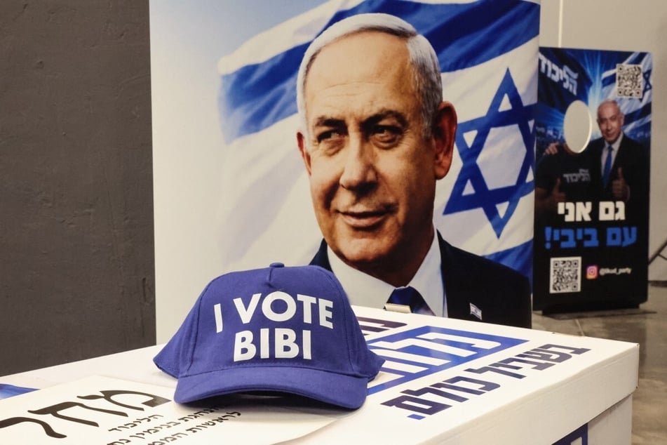a cap bearing the slogan "I Vote Bibi" displayed alongside other campaign materials featuring Israeli Prime Minister Benjamin Netanyahu ahead of a Jewish New Year greetings event attended by the prime minister and members of the Likud party in Tel Aviv on September 17, 2026.