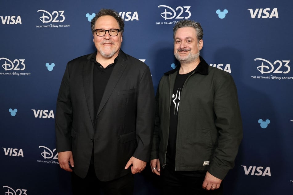 Director John Favreau and producer Dave Filoni teased more details about the upcoming Star Wars film The Mandalorian & Grogu at Disney's D23 convention.