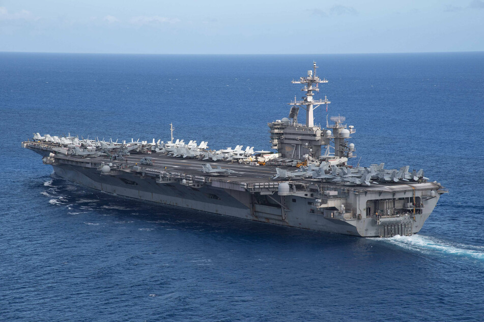 China slams US for sending aircraft carriers to disputed waters