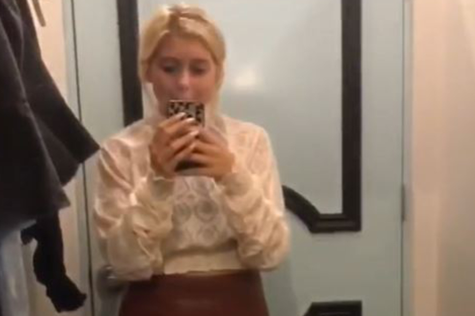 Macey Leap filmed herself in the mirror of the dressing room.